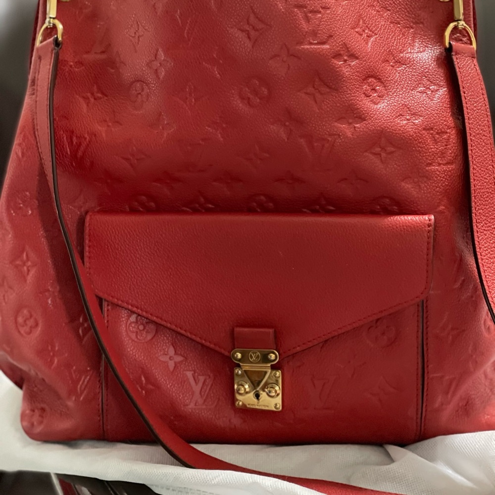 Red LV, shoulder bag also hand bag. In very good condition